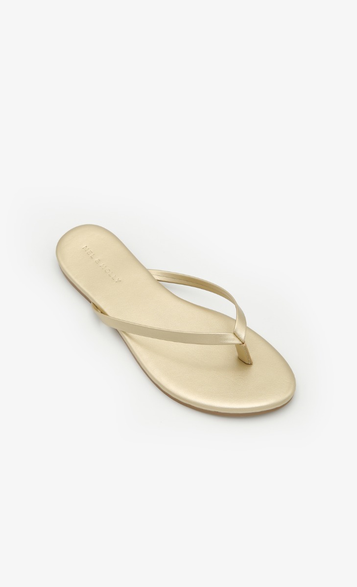 FOMO Flip Flops In Gold