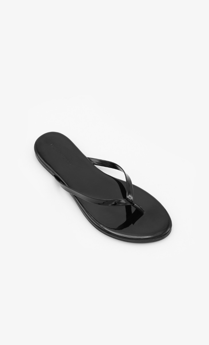 FOMO Flip Flops In Black